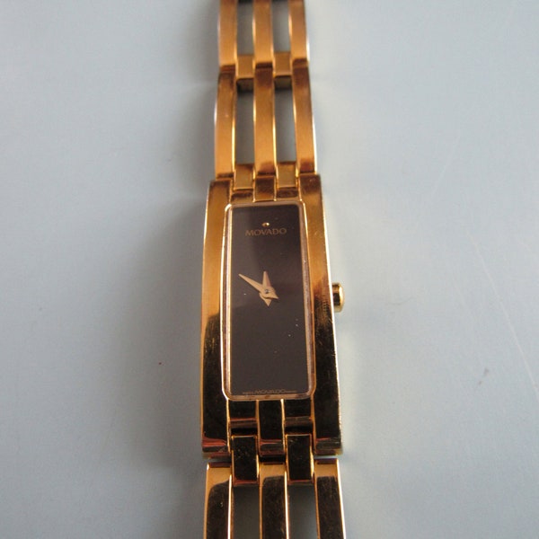 Vintage Women's Movado Gold Tone Watch Model Rectangular Black Face Works Well Free Shipping