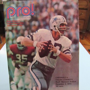 May include: Vintage "Pro!" magazine cover featuring a football player in a white uniform with a star on the helmet, throwing a football. The cover includes the text "CARDINALS vs DALLAS COWBOYS" and the date "December 3, 1972".