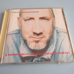 May include: CD case featuring a close-up of a man with a beard and blue eyes. The text "the best of petetownshend" is at the top. Red text at the bottom reads "coolwalking smooth talking kings straight smoke firestoking".
