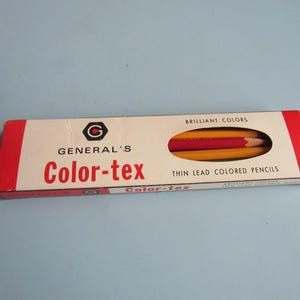 May include: A rectangular cardboard box of General's Color-tex thin lead colored pencils. The box is white with red ends and features the text General's Color-tex, Brilliant Colors, and Thin Lead Colored Pencils. A cutout reveals yellow and red pencils.
