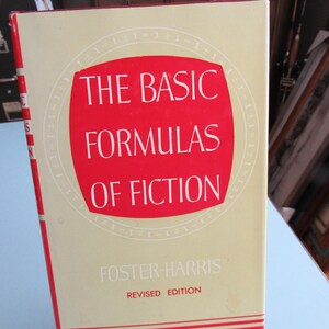 May include: A yellow and red book titled "The Basic Formulas of Fiction" by Foster-Harris, revised edition.