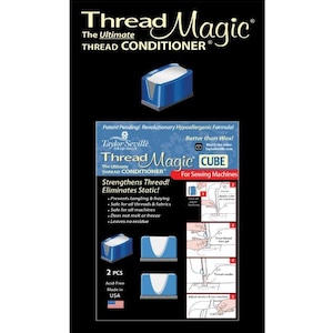 May include: A product image for Thread Magic, a thread conditioner for sewing machines. The image features a blue and white cube-shaped product, with text highlighting its benefits: strengthens thread, eliminates static, and prevents tangling.