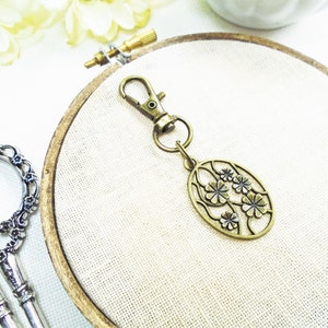 Bronze flower zipper pull or scissor fob