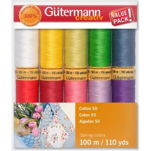 May include: A package of Gütermann Creativ sewing thread in a variety of spring colors. The threads are in white, yellow, green, blue, red, pink, and purple. The package includes 100 m / 110 yds of thread per spool. The package also includes the text "Cotton 50".