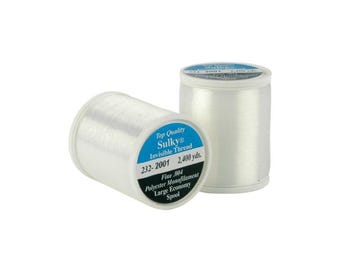 May include: A spool of Sulky Invisible Thread, a clear monofilament thread for sewing and crafts. The spool is labeled with the brand name, thread type, and yardage: 2,400 yards. The label also states "Top Quality" and "Fine 004".
