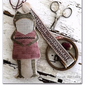 May include: A rustic wooden sign with the text "Welcome to our home" in white lettering. The sign features a distressed finish and a simple, inviting design, perfect for a front porch or entryway.