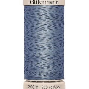 May include: A spool of Gütermann thread in a muted blue color. The thread is tightly wound around a cylindrical core. The top of the spool has the Gütermann logo, and the bottom reads "200 m - 220 yds/vgs".