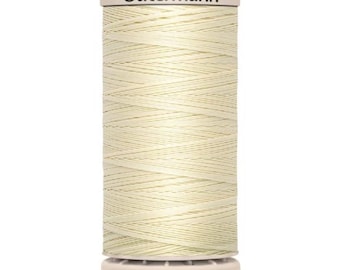 May include: A spool of off-white sewing thread by Gütermann. The spool has a white top and bottom with the brand name printed on the top. The bottom of the spool has the text "200 m - 220 yds/vgs". The thread is tightly wound around the spool.