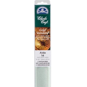 May include: Aida 14 cross stitch fabric in a light seafoam green color. The packaging features the "DMC Charles Craft Gold Standard" logo and product information. The fabric measures 36" x 44" (91.4 x 111.8 cm).