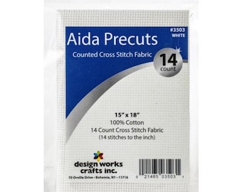 May include: Aida Precuts counted cross stitch fabric in a clear plastic package. The white fabric measures 15" x 18" and is 100% cotton, with a 14-count weave. The package features the text "Aida Precuts" and "14 count".