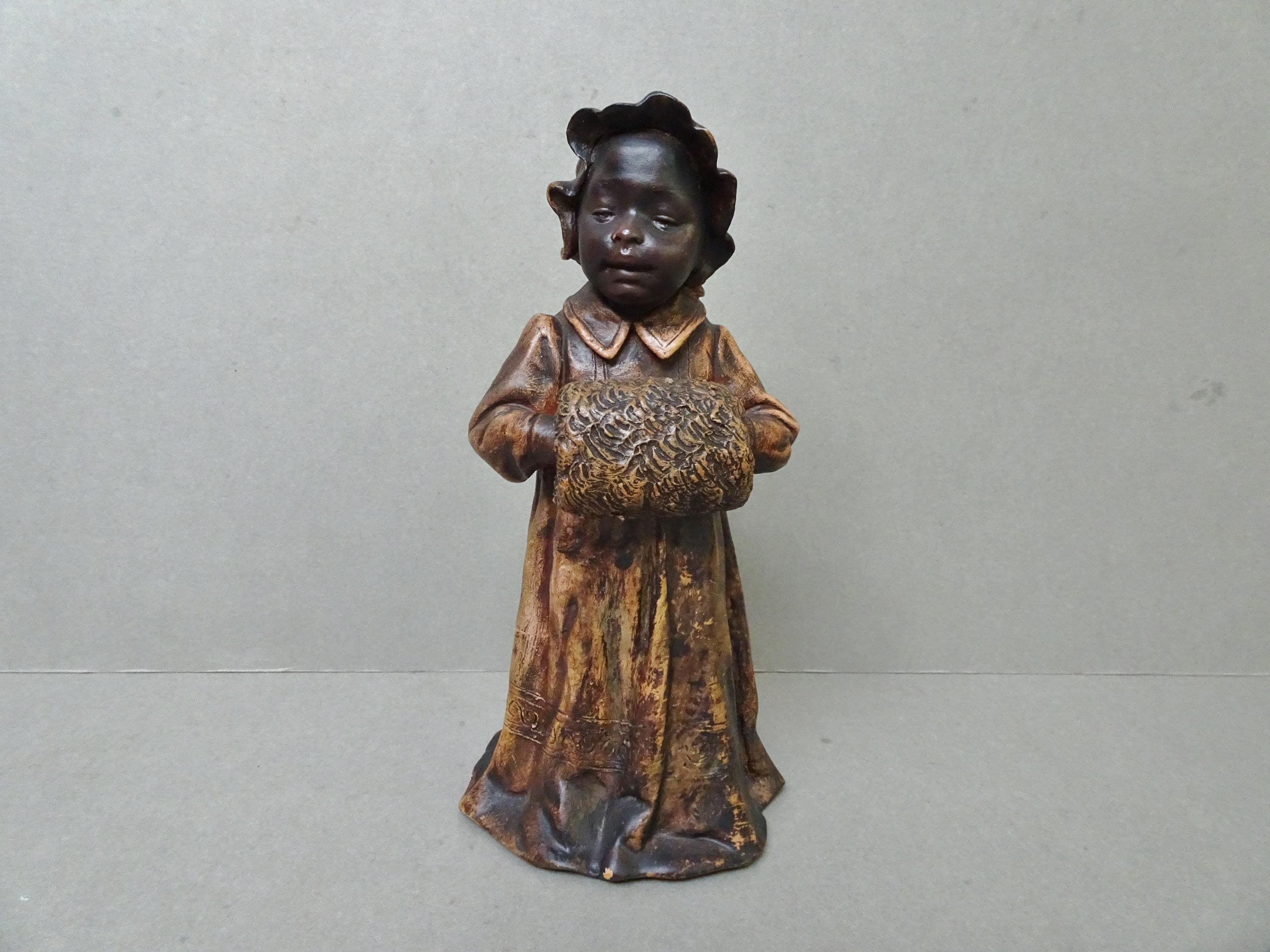Goldscheider terracotta figure of a black girl. Late 19th century.