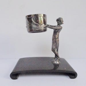 Art Nouveau Silver plate Figural Bottle or Decanter Holder. Circa 1900. Probably WMF