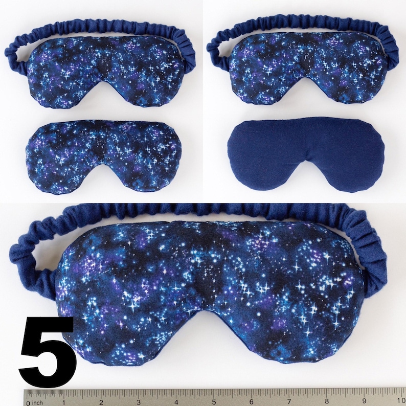 May include: A blue sleep mask with a galaxy print. The mask has a soft, comfortable fabric and is designed to block out light. The mask is shown in three different positions, with the number "5" in the bottom left corner.