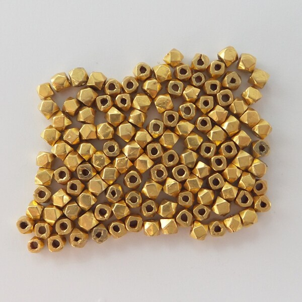 Wonderful 20 kt gold small faceted spacer beads. Cornerless beads. Bali style beads. Handcrafted in India. Collectible. IGB59