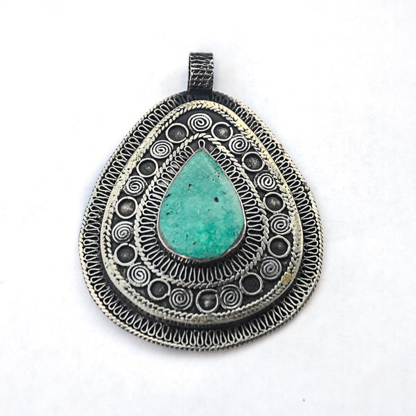 7 Hand Crafted Silver and Turquoise Afghan Pendant.