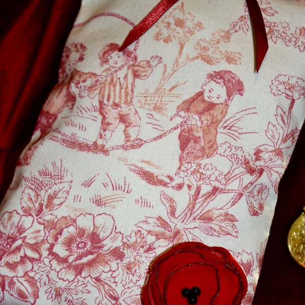 coussin décoratif à suspendre  en coton inspiration toile de Jour écru et rouge