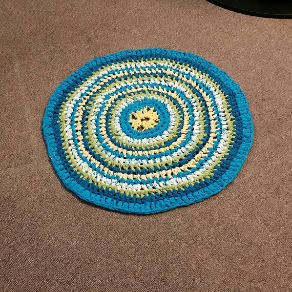 Items similar to Multicolored, round rag rug. Teal blue, yellow, white