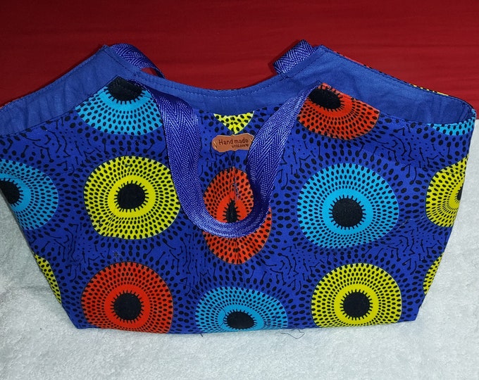 Pretty basket bag in African wax loincloth, very colorful