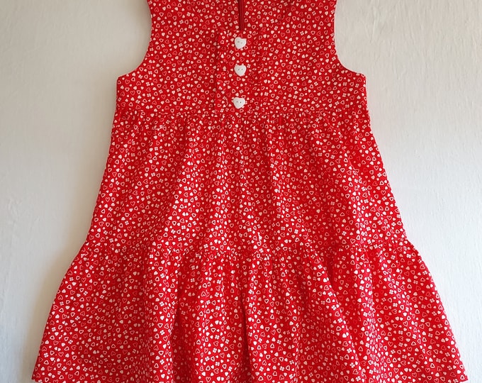 Slightly satiny red dress with white print ruffles for 4 year old girl