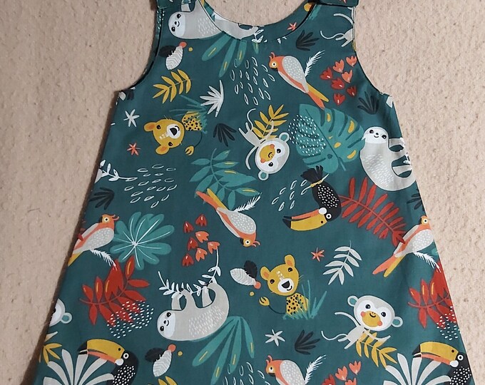 Pretty little dress 18/24 months in green oeko tex cotton with savannah prints, trapeze shape. Ready to ship.