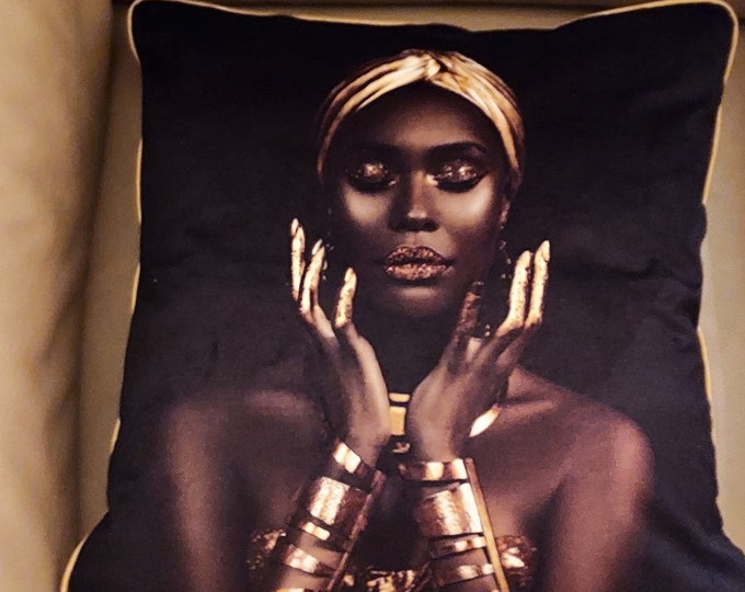 pretty black velvet cushion with African woman's body surrounded in gold color