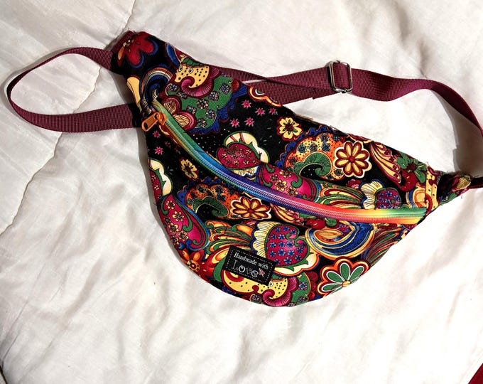 Small multi-colored wax fanny pack, large strap