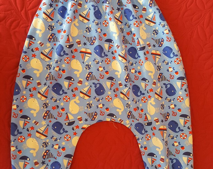 Ideal for winter, blue jersey and elastane sarouel pants with patterns, lined, finished with a ribbed edge, unique piece for boys, 4 years old