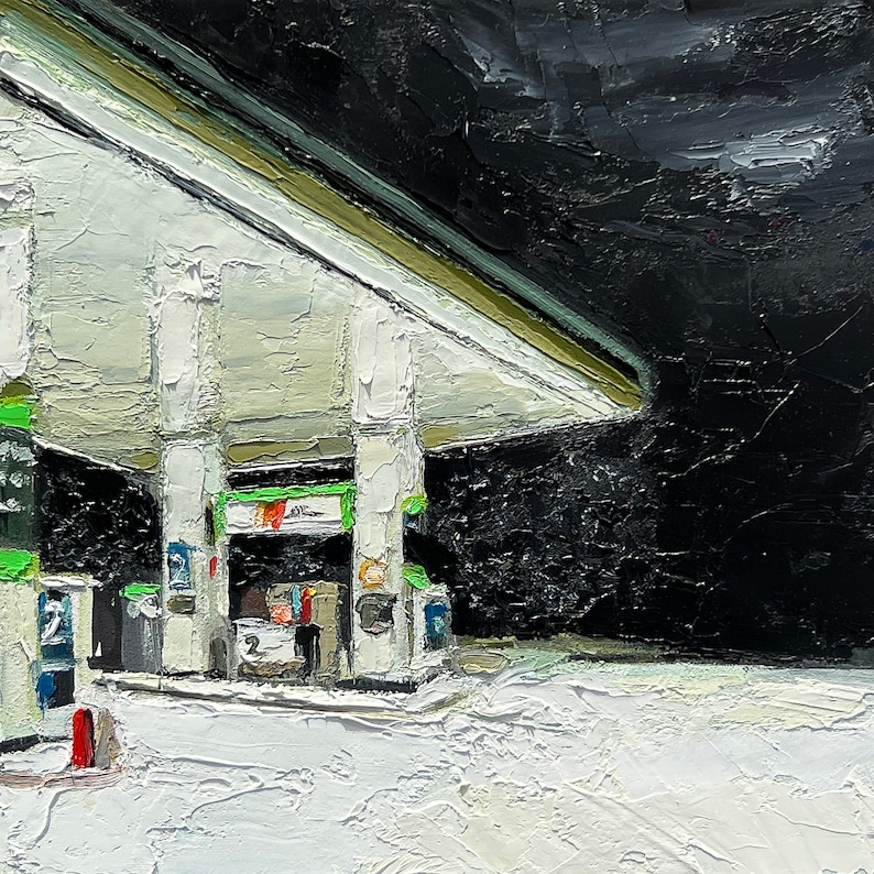 May include: A white and green petrol station canopy with a black night sky in the background. The canopy has two petrol pumps and a sign that says "2".