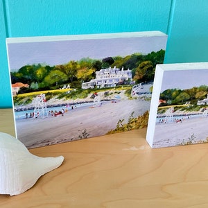 The Chanler at the Beginning of Cliff Walk as it Overlooks First Beach in Newport Rhode Island print on freestanding white wood block