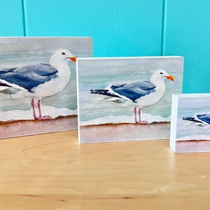 Standing Seagull print mounted on white wood blocks