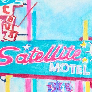 May include: A watercolor painting of a vintage motel sign with the words "Satellite Motel" in pink lettering on a turquoise background. The sign is surrounded by yellow stars and a white sun.
