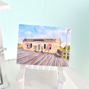 Fishin Pier Grille Avalon New Jersey print mounted on white wood block is freestanding