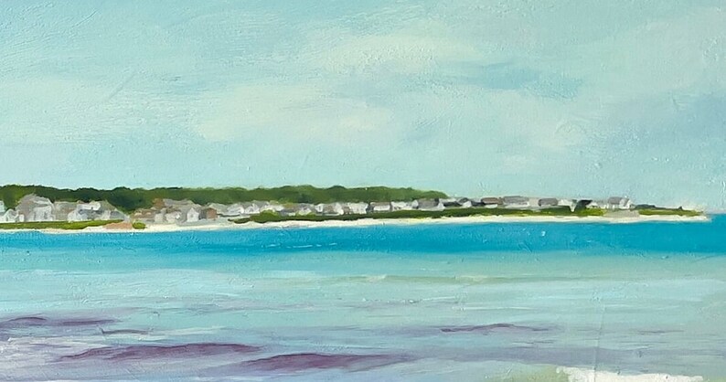 detail of a painting of water in green blues and lavenders with houses in the far distance