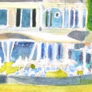 Detail view of the Castle Hill Inn outdoor eating venue with white patio umbrellas and lawn.