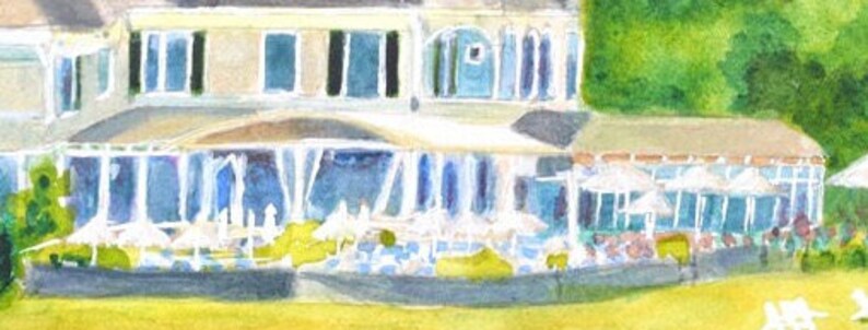 Detail view of the Castle Hill Inn outdoor eating venue with white patio umbrellas and lawn.