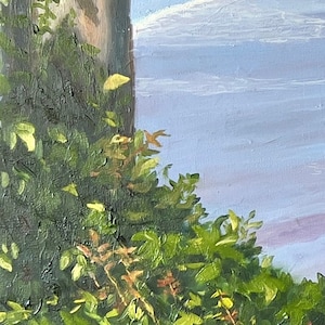 Detail of bushes and trees with water in the background
