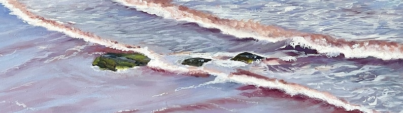 Maroon water with waves and rocks