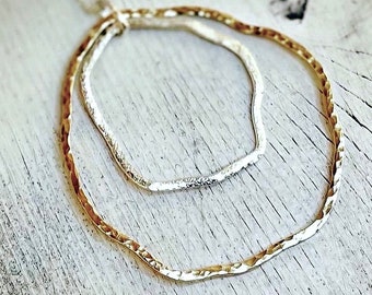 Hammered circles, sterling silver, 14k yellow gold fill.