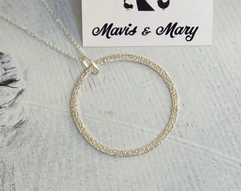 Sterling Silver circle necklace, hand forged & textured.