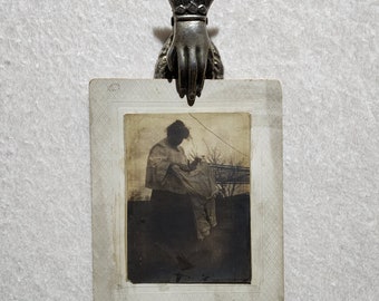 Antique, late 1800s cabinet card of a faceless lady hanging clothing outdoors. Spooky! Ghost?!