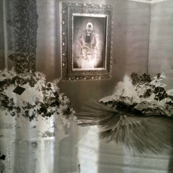 RARE Antique glass negative of a casket in a parlor funeral