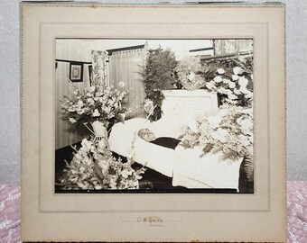 Post mortem photograph of a man in his casket. Orginal picture housed in a large art deco folder. 1930s or 1940s. Illinois. Grandpa.