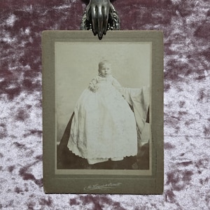 Adorable identified 6 month old baby cabinet card. Victorian era antique photo. Hidden mother's arm.