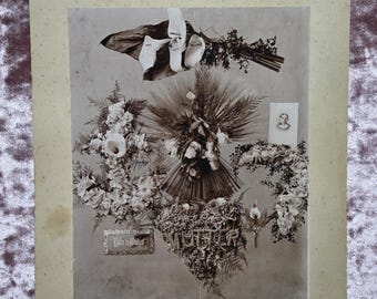 Antique Victorian era memorial photo. Funeral flowers and photo of a deceased woman. Mourning. Mutter.
