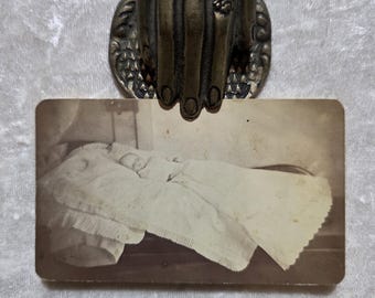 Antique, CDV photo of a haunting post mortem baby in a burial gown. Victorian mourning era.