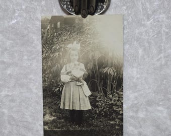 Antique RPPC picture postcard of a little holding a kitten!