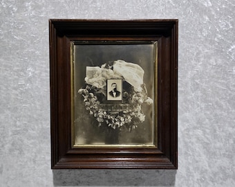 A large Victorian era, mourning cabinet card photo. Funeral floral arrangements for Father.