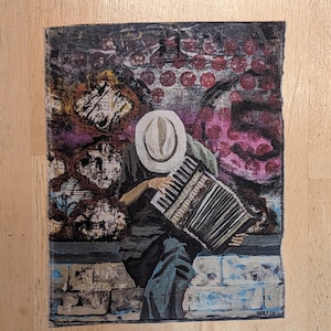 May include: A rectangular canvas painting depicting a person wearing a white hat and dark clothing, playing an accordion. The background features abstract patterns in shades of purple, red, and brown. The artist signature WOLF 26 is in the corner.