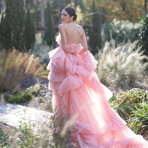 Ruffled layered tulle wedding gown with bridal cape and sleeves, Editorial dusty pink tulle gown for styled shoots