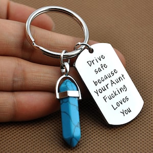 Rijd veilig omdat je tante/moeder van je houdt | Sleutelhanger | Volwassen taal | Cadeau voor dochter | Cadeau voor zoon/kristal sleutelhanger/hanger sleutelhanger